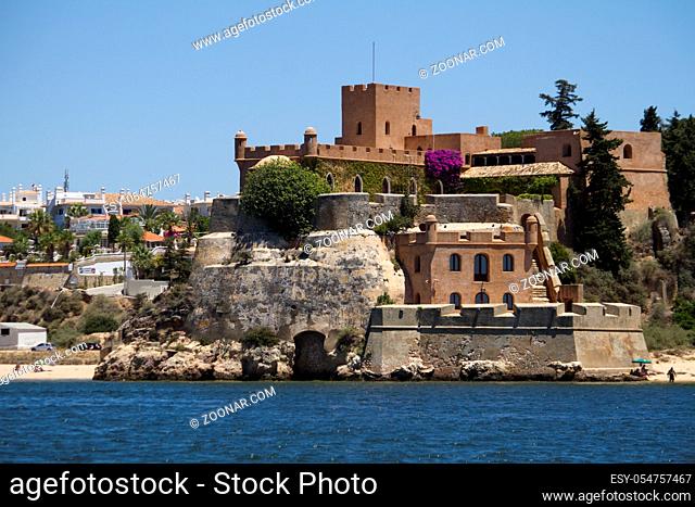 View of the beautiful castle in the Ferragudo city on the Algarve, Portugal