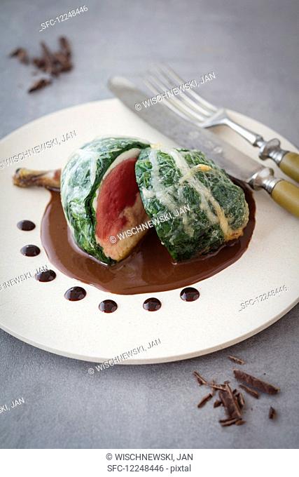 Pigeon roulade with a spinach coating