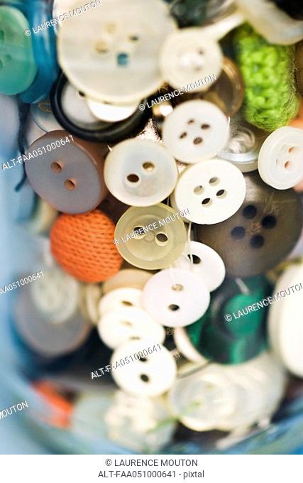 Buttons in glass jar