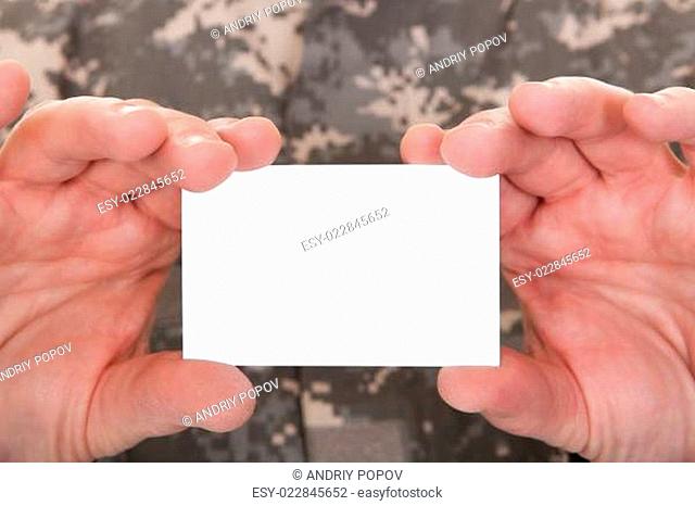 Mature Soldier Holding Blank Paper