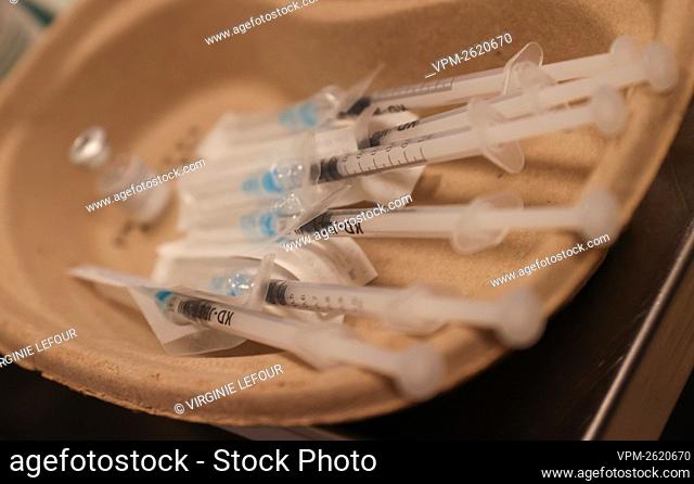 Illustration picture shows preparation of a vaccine shot, during the vaccination of the residents of the Quietude elderly home in Montigny-le-Tilleul