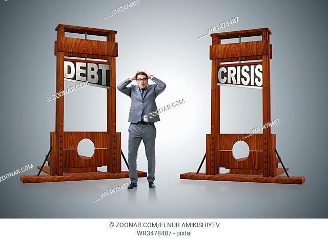 Businessman in heavy debt business concept
