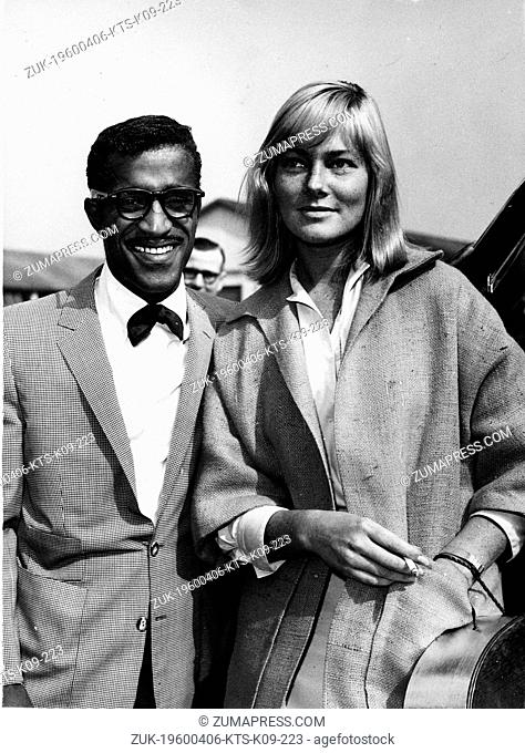 Apr. 6, 1960 - London, England, U.K. - SAMMY DAVIS JR. seen here in London greeting Swedish actress MAY BRITT as she arrived from Hollywood