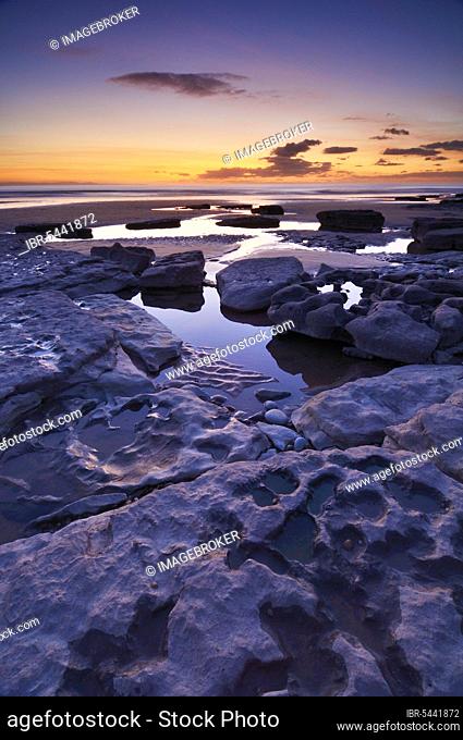Winter sunset over Dunraven Bay at Southerndown on the Glamorgan Heritage Coast, Wales, Great Britain