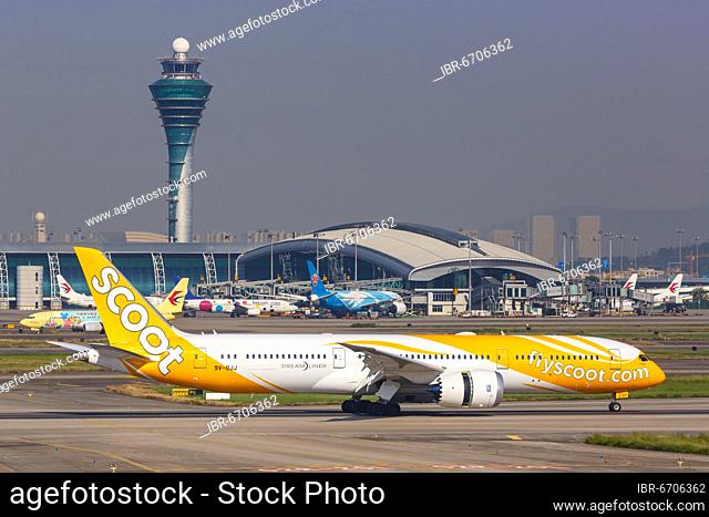 A Boeing 787-9 Dreamliner aircraft operated by Scoot with registration number 9V-OJJ at Guangzhou Airport, China, Asia