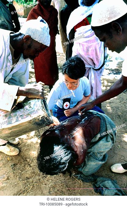 El Geneina Sudan Red Cross Nun Teaching Basic Health Care With Soap