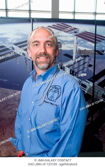 American spaceflight participant Richard Garriott poses for a portrait following an Expedition 18Soyuz 17 pre-flight press conference at NASA's Johnson Space...