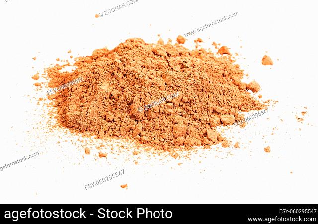 pile of cocoa powder isolated on white background
