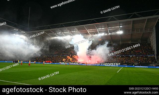 fans and supporters of Lens using pyrotechnical flares and fireworks during the Uefa Champions League matchday 6 game in group B in the 2023-2024 season between...