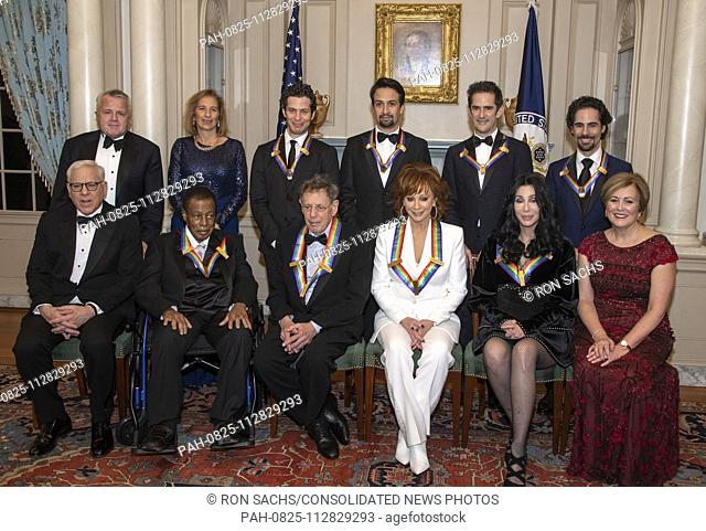 The recipients of the 41st Annual Kennedy Center Honors pose for a group photo following a dinner hosted by United States Deputy Secretary of State John J