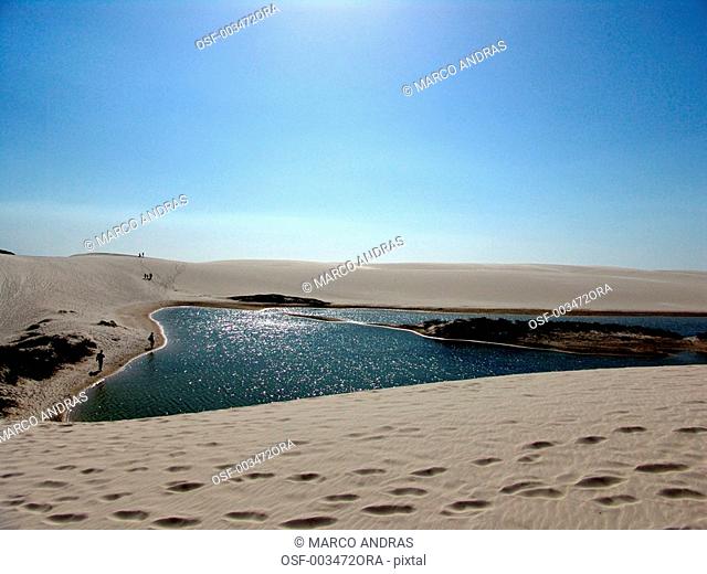 sao luis do maranhao national park of lencois maranhenses a pond in teh middle of sand dunes