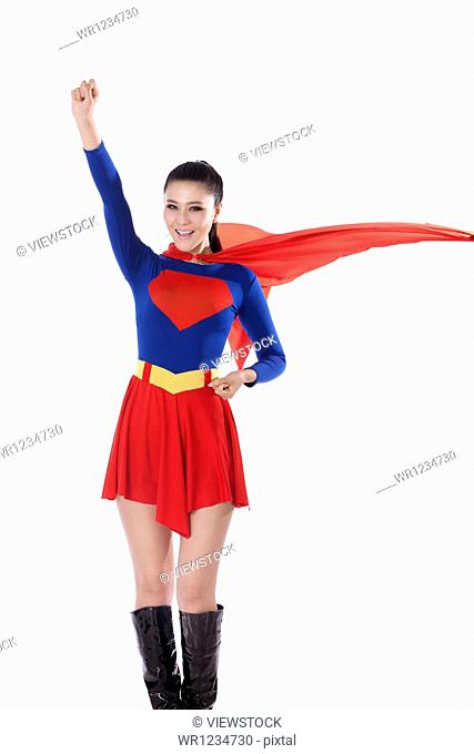 Young woman in superman outfit