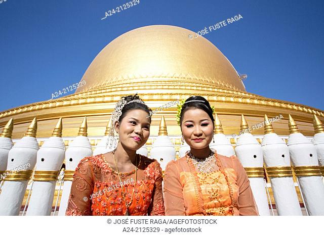 Myanmar , near Mandalay , Sagaing City, Kaung Hmu Taw Pagoda, local girls