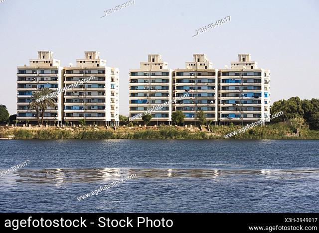 Residential buildings built for employees of the nearby sugar factory on the banks of the Nile river, Egypt, northeast Africa