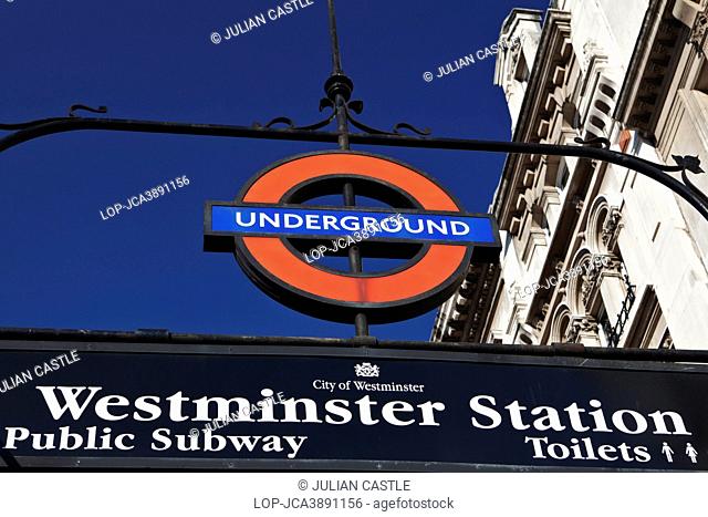 England, London, Westminster. Underground sign outside Westminster station