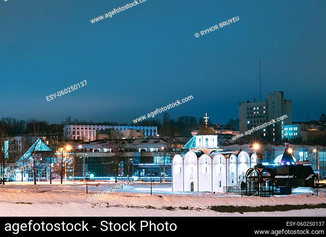 Vitebsk, Belarus. Winter View Of Church Of Annunciation And Wooden Church Of St. Alexander Nevsky In Night Illuminations