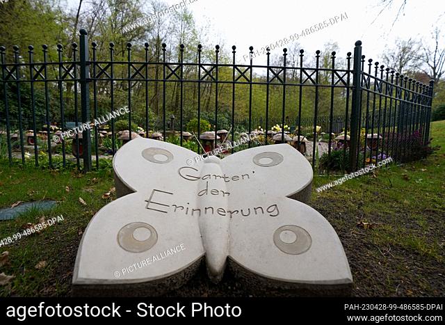 PRODUCTION - 27 April 2023, Hamburg: A butterfly with the inscription ""Garden of Remembrance"" stands in front of the Garden of Remembrance of the...