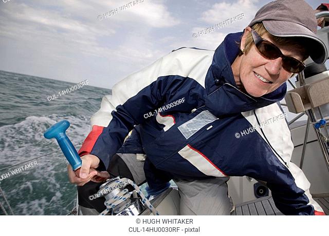 Mature woman sailing