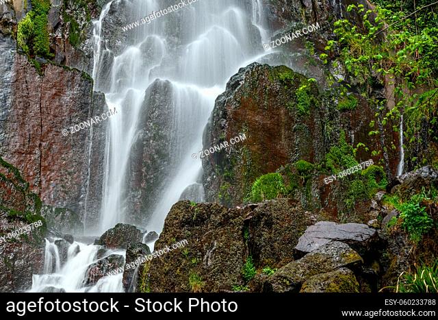 Nideck waterfall in a Vosges forest in France in early spring