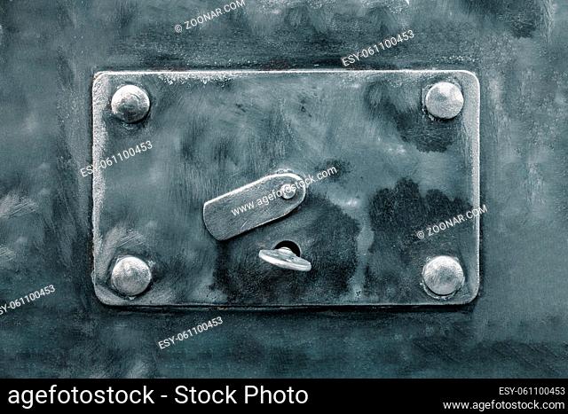 Internal lock of the safe close-up. A brutal metal savings box. The concept of reliable protection of deposits and finances