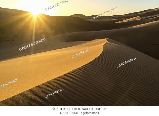 sunrise in the Sahara desert near Merzouga, Kingdom of Morocco, Africa