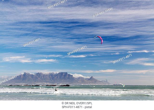 Kite surfing in Table Bay with Cape Town and Table Mountain in the distance, Western Cape, South Africa