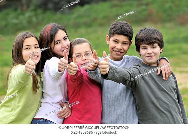 Group of children, thumbs up. Spain