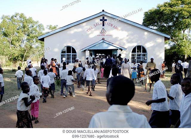 Zimbabwe, Mashonaland Central, Nyachuru Township. May 2010. End of the Sunday Service at the Salvation Army Nyachuru Citadel