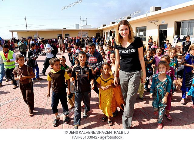 EXCLUSIVE - UNICEF ambassador Eva Padberg is surrounded by refugee children in the Debaga refugee camp between Mosul and Erbil, Iraq, 18 October 2016