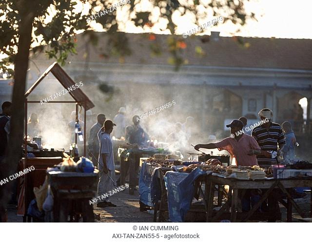 Fish and meat barbeques at dusk, Forodhani Gardens, Stone Town, Zanzibar, Tanzania
