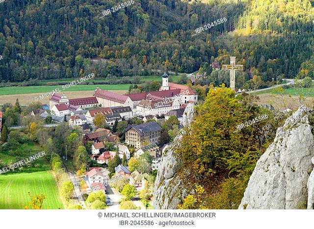 View of the Petersfels rock formation and Kloster Beuron monastery, upper Danube valley, Landkreis Sigmaringen district, Baden-Wuerttemberg, Germany, Europe