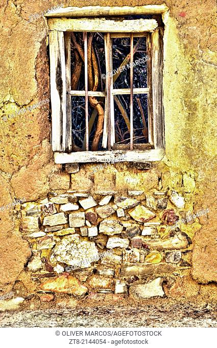 In Leon, in the Northwest of Spain, there are many abandoned villages, you can still see houses built as before, with stone, wood, brick ""adobe"", clay tiles