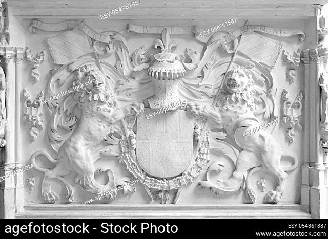 coat of arms, bas-relief on the facade of the building