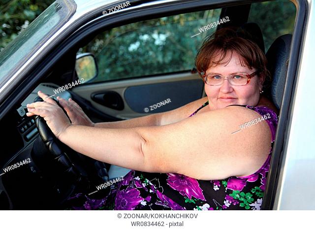 overweight woman behind the wheel