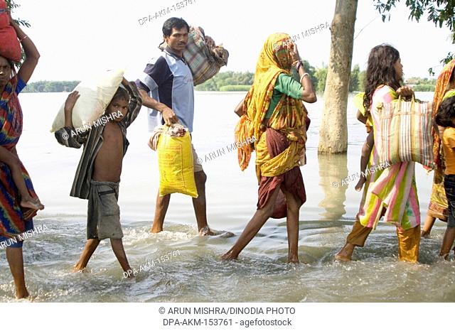 Kosi river flood in year 2008 which mostly made suffered below poverty line people in Purniya district ; Bihar ; India