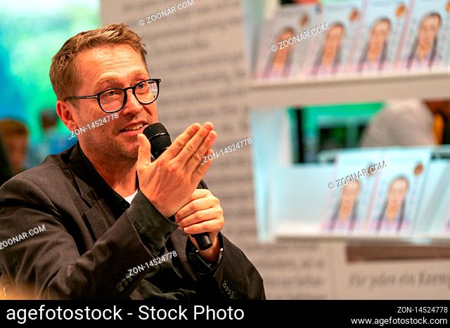 FRANKFURT AM MAIN, Germany - October 19 2019: Jan Weiler (*1967, German journalist and writer) talking on stage at 71st Frankfurt Book Fair / Buchmesse...