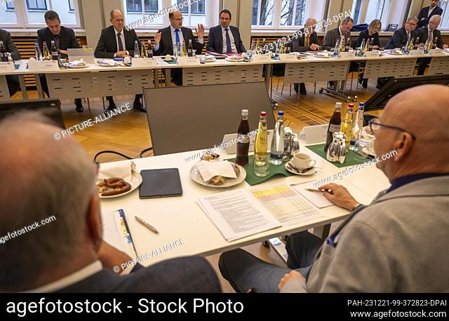21 December 2023, Bavaria, Munich: Under the leadership of Albert Füracker, (3rd from left)(CSU) Minister of State for Finance and Home Affairs