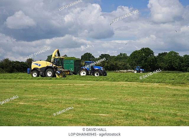 England, Wiltshire, Near Cricklade, Cutting grass for hay at Blakehill Nature Reserve