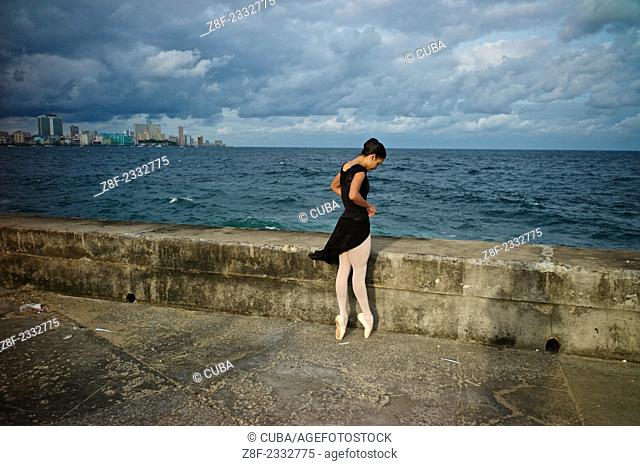 Ballerinas from the National Ballet of Cuba directed by world reknown Alicia Alonso dance on the Malecon