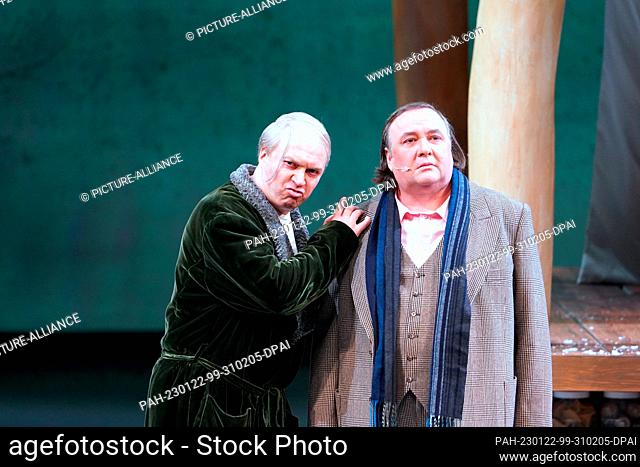 18 January 2023, Hamburg: Alexander Roslavets (l) as Boris Timofeyevich Ismailov and Vincent Wolfsteiner as Zinoviy Borisovich Ismailov perform during the photo...