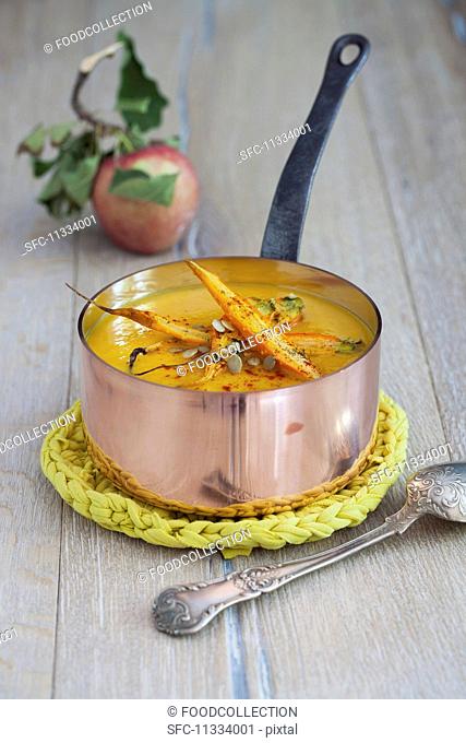 Pumpkin and apple soup with roasted carrots and pumpkin seeds