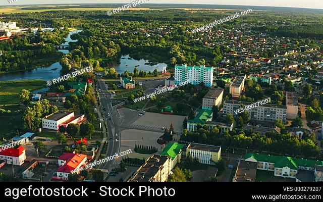 4K Dobrush, Gomel Region, Belarus. Aerial View Of Old Paper Factory. Bird's-eye View Summer. Aerial View Of Residential Area Of Small European Town With Houses