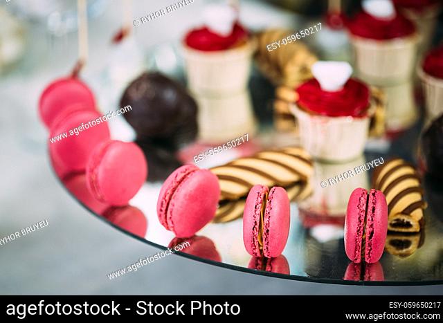 Dessert Sweet Tasty Macarons In Candy Bar On Table. Delicious Sweet Buffet. Wedding Holiday Decorations