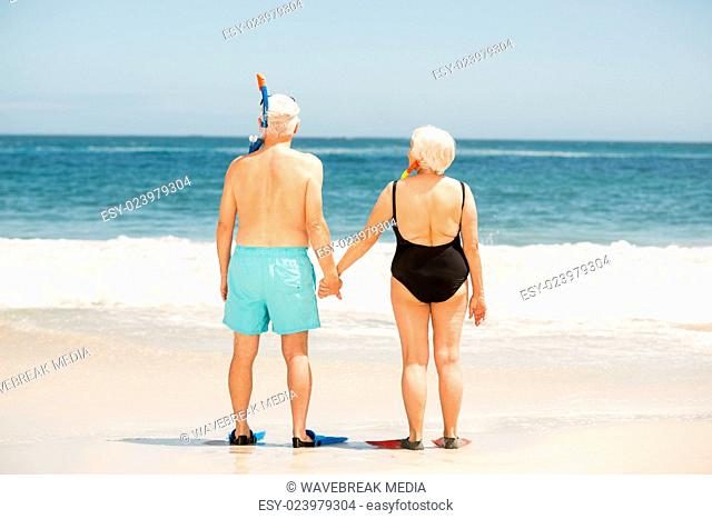 Senior couple wearing flippers