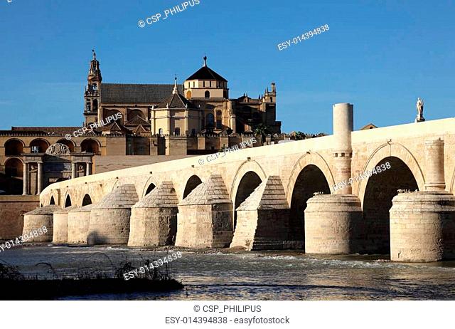 Roman Bridge with the Cathedral-Mosque of Cordoba in the background. Andalusia, Spain