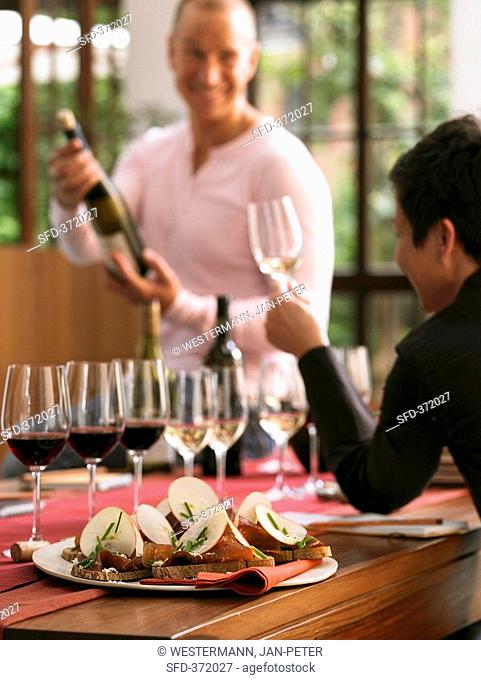 Wine tasting with open sandwiches