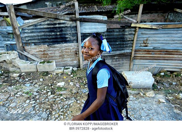 Girl, 9 years, on her way to school, Camp Icare for earthquake refugees, Fort National, Port-au-Prince, Haiti