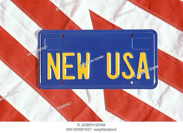 New USA license plate on stripes of American flag