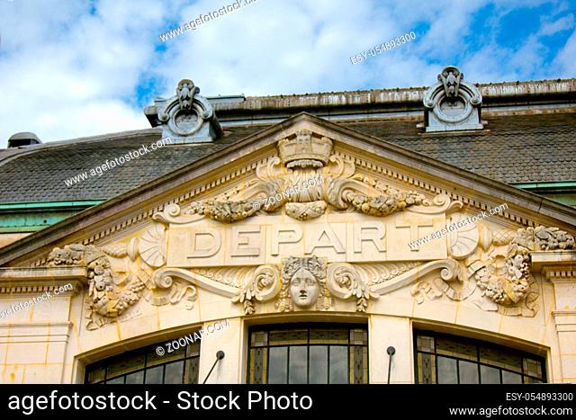 The glyptic, medallions on the buildings for decoration, masverk, stucco. Limoges station, departure hall
