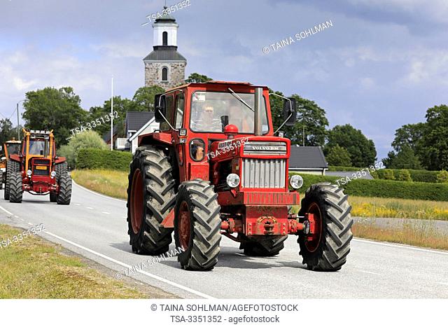 Kimito, Finland. July 6, 2019. Red Volvo BM 814 tractor on Kimito Tractorkavalkad, annual vintage tractor parade. The 814 was introduced in 1969